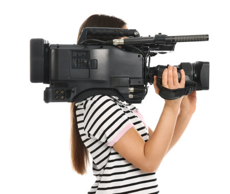 Operator with professional video camera on white background