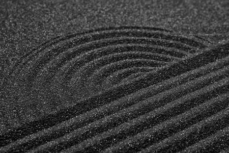 Close up view of beautiful black sand. Zen and harmonyの写真素材