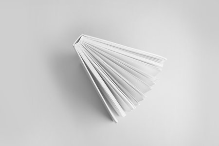 Hardcover book on gray background, top viewの写真素材