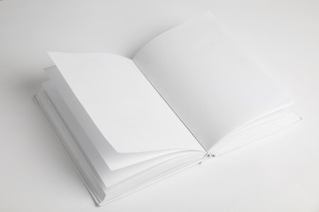Open book with blank pages on white backgroundの写真素材