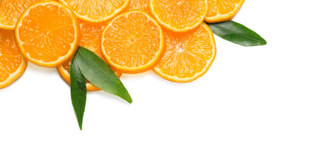 Composition with slices of fresh ripe tangerines and leaves on white background, top view. Citrus...