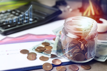 Glass jar with money on table, space for text