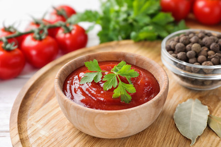 Delicious fresh tomato sauce on table, closeupの写真素材