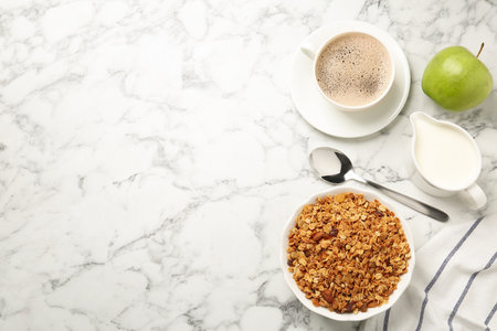 Tasty healthy breakfast on marble table, flat lay. Space for textの写真素材