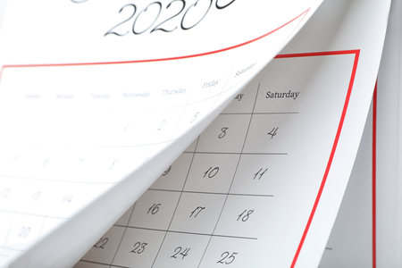 2020 paper calendar with turning pages as background, closeupの写真素材