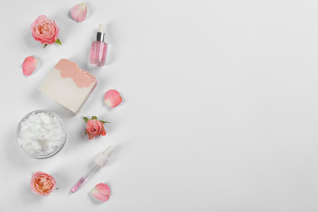 Flat lay composition with natural handmade soap and ingredients on white background. Space for textの写真素材