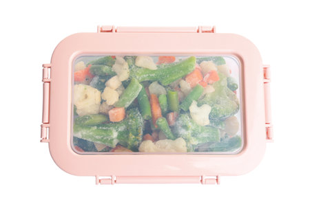 Frozen vegetables in plastic container isolated on white, top viewの写真素材