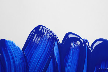 Paint strokes on white background background, top view. Color of the year 2020 (Classic blue)の写真素材