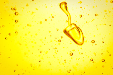 Cooking oil with bubbles as background, closeupの写真素材