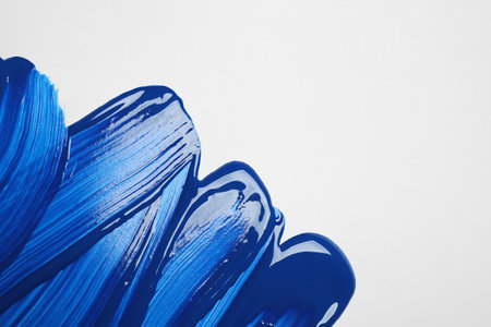 Paint strokes on white background background, top view. Color of the year 2020 (Classic blue)の写真素材