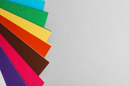 Color palette on light gray background, top view. Space for text