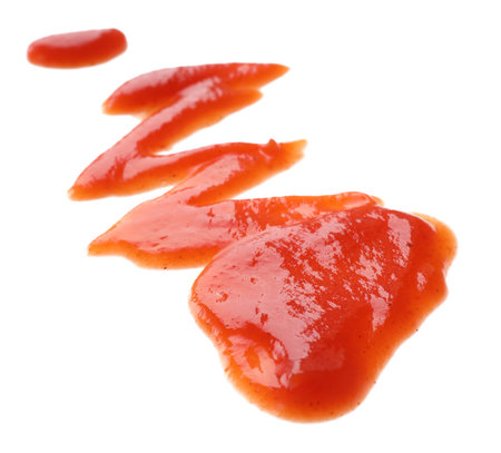 Tasty fresh tomato sauce isolated on whiteの写真素材