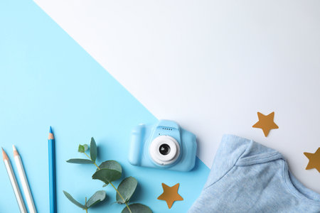 Flat lay composition with toy camera on color background, space for text. future photographerの写真素材