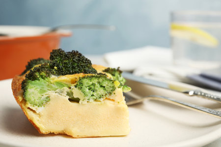 Tasty broccoli casserole on plate, closeup. Space for textの写真素材