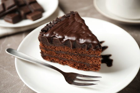 Tasty chocolate cake served on gray table, closeupの写真素材