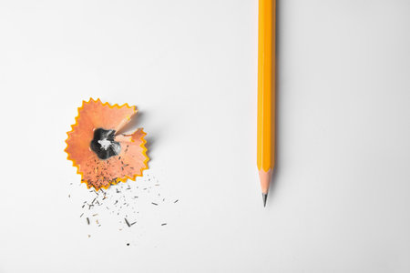 Graphite pencil and shaving on white background, top viewの写真素材