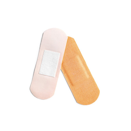 Medical sticking plasters isolated on white. First aid item