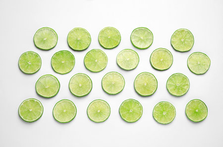 Juicy fresh lime slices on white background, top viewの写真素材