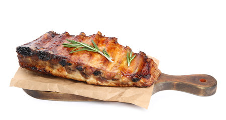 Tasty grilled ribs with rosemary isolated on whiteの写真素材