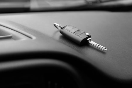 Key in new modern automobile. car buying