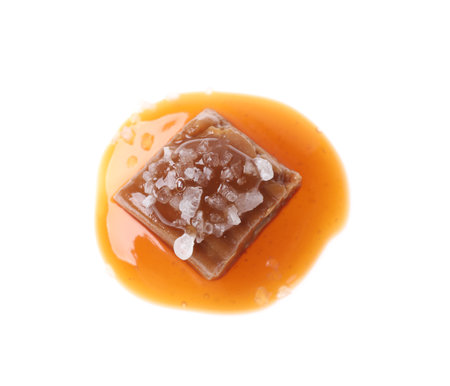 Delicious salted caramel with sauce on white background, top viewの写真素材