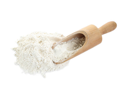 Organic flour and wooden scoop isolated on white, above viewの写真素材