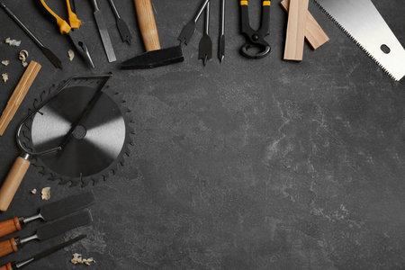 Flat lay composition with carpenter's tools on gray background. Space for textの写真素材