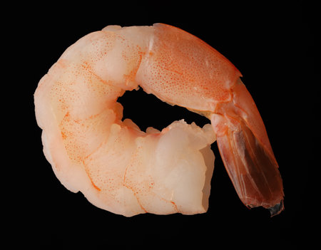 Freshly cooked delicious shrimp on black backgroundの写真素材
