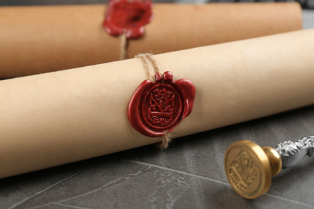 Notary's public pen and sealed document on gray stone table, closeupの写真素材