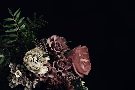 Beautiful bouquet of different flowers on black background, space for text. Floral card design with dark vintage effectの写真素材