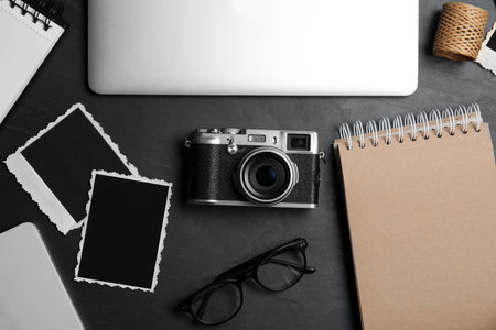 Workplace of designer with camera, flat layの写真素材