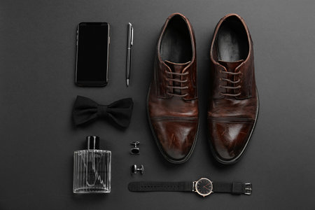 Flat lay composition with male accessories on black backgroundの写真素材