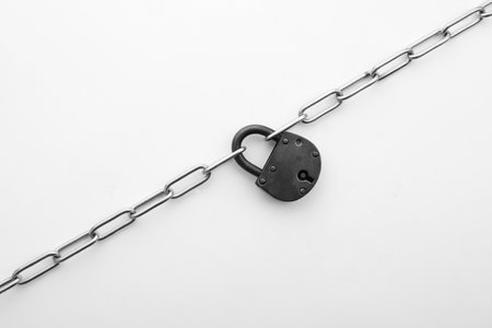 Steel padlock and chain isolated on white, top view. safety conceptの写真素材