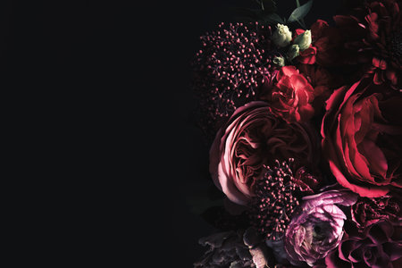 Beautiful bouquet of different flowers on black background, space for text. Floral card design with dark vintage effectの写真素材
