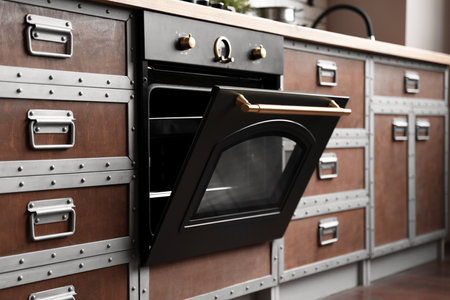New modern oven in stylish kitchen. Cooking appliance