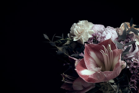 Beautiful bouquet of different flowers on black background, space for text. Floral card design with dark vintage effectの写真素材