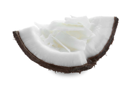 Tasty fresh coconut flakes isolated on whiteの写真素材