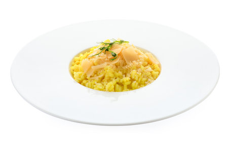 Delicious risotto with cheese isolated on whiteの写真素材