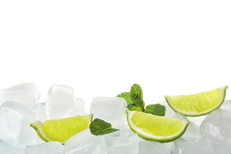 Ice cubes, mint and lime slices on white backgroundの写真素材