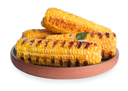 Delicious grilled corn cobs isolated on whiteの写真素材