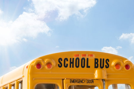 Yellow school bus outdoors, closeup. Transport for students
