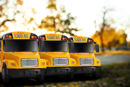 Yellow school buses outdoors. Transport for studentsの写真素材