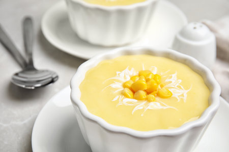 Delicious corn cream soup in bowl, closeupの写真素材