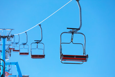 Empty chairlift at mountain ski resort. winter holidays