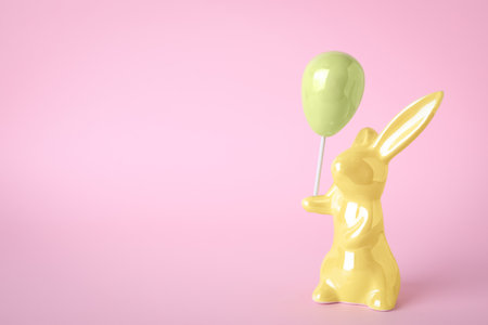 easter bunny figure on pink background. Space for textの写真素材