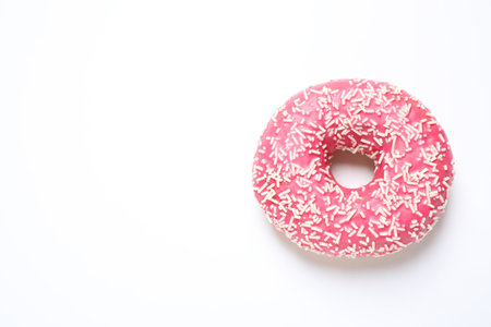 Delicious glazed donut on white background, top view. Space for textの写真素材