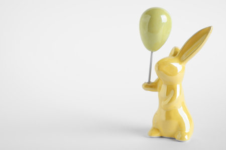 Easter bunny figure on white background. Space for textの写真素材