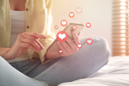 Young woman using modern smartphone at home, closeup