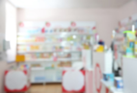 Blurred view of modern pharmacy interior with different medicinesの写真素材