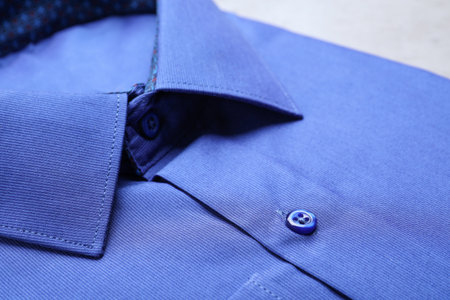 Close up view of stylish blue shirt. Dry-cleaning serviceの写真素材